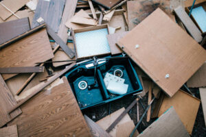A junk debris of cabinets and other parts of a kitchen being torn apart for a house renovation. As viewed from above.